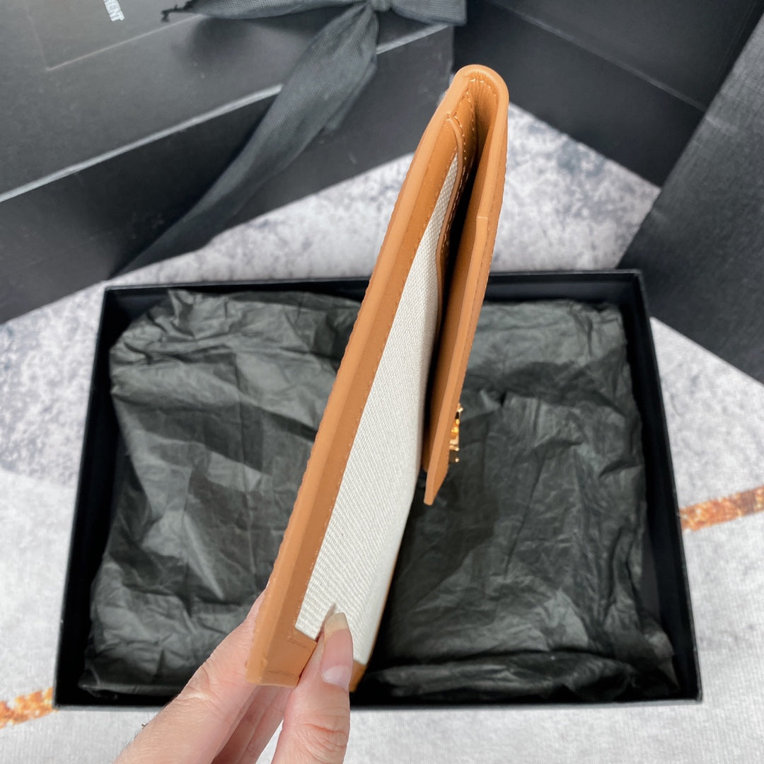 UPTOWN POUCH 27 IN WHITE CANVAS AND BROWN LEATHER TRIM GOLD LOGO mysite