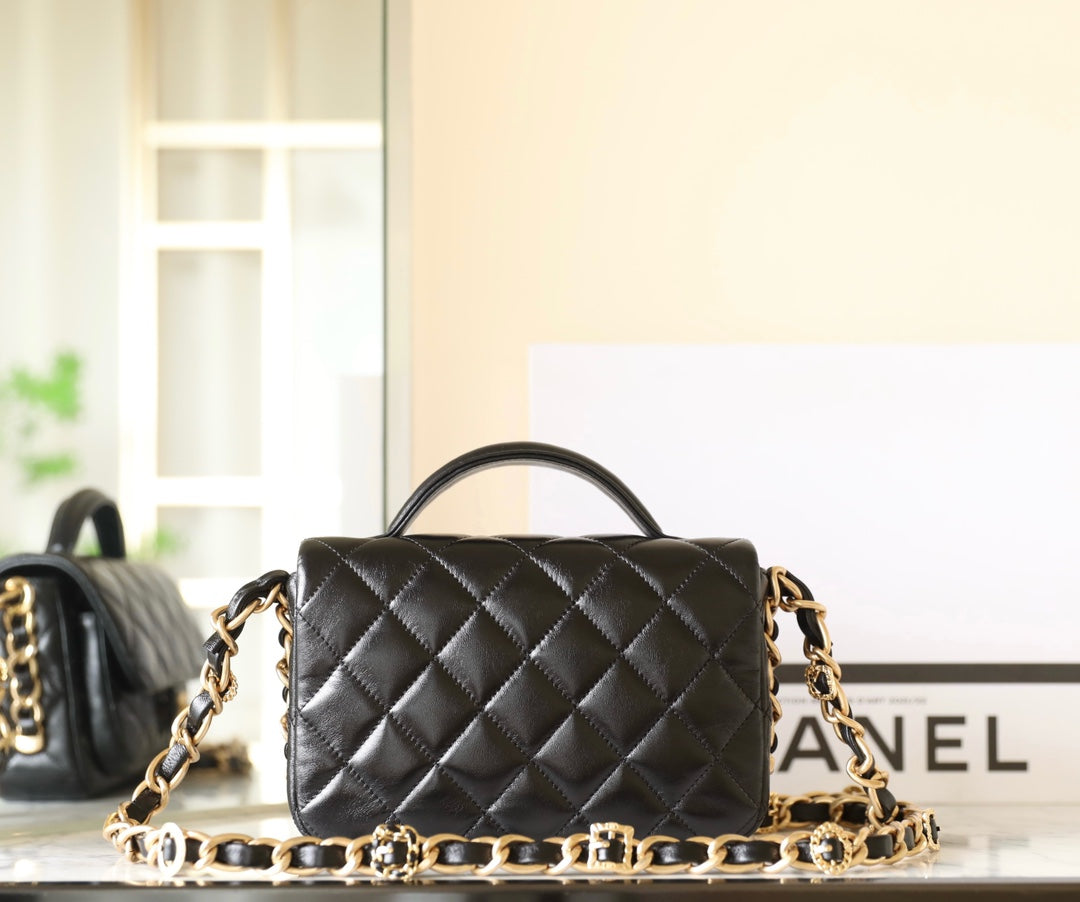 cc 24a flap bag 20cm top handle black lambskin gold hardware