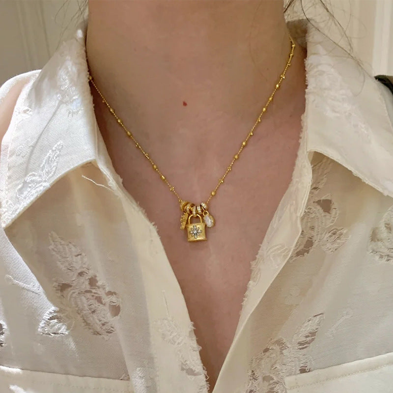 Elegant Cross & Lock Pendant Necklace – Dainty Gold Chain with Crystal Charms mysite