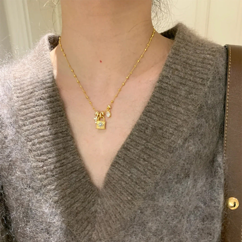 Elegant Cross & Lock Pendant Necklace – Dainty Gold Chain with Crystal Charms mysite
