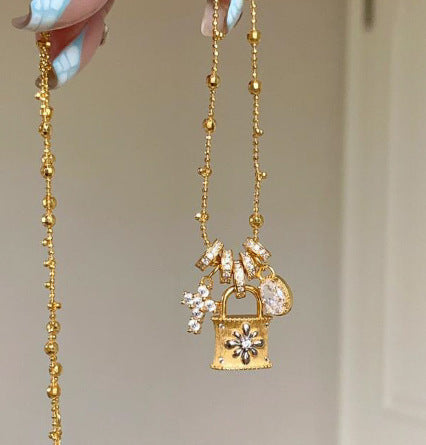 Elegant Cross & Lock Pendant Necklace – Dainty Gold Chain with Crystal Charms mysite