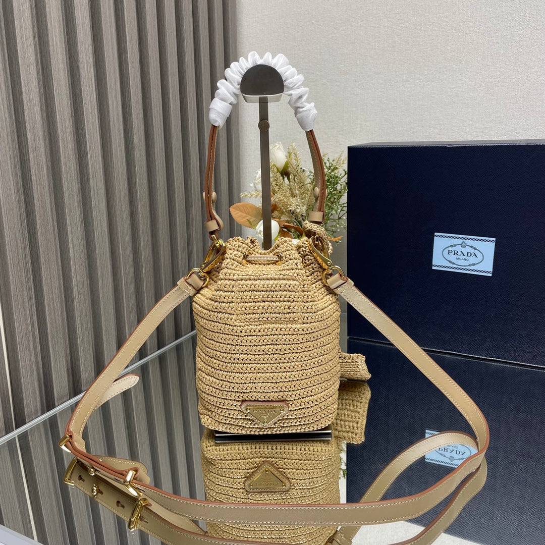 BUCKET BAG 20 IN BEIGE WOVEN RAFFIA EMBOSSED LOGO mysite