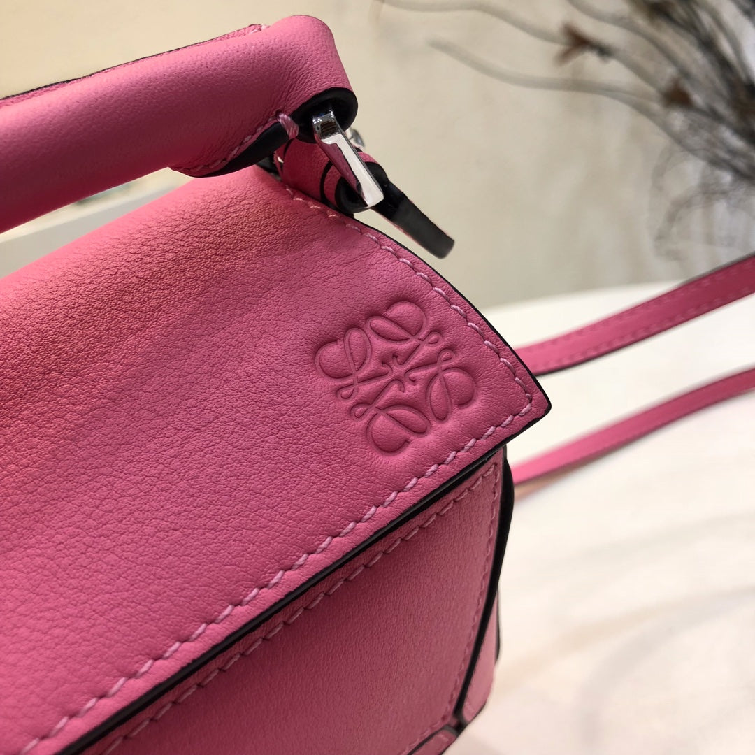 LOE MINI 18 PUZZLE BAG IN DEEP PINK CALFSKIN mysite