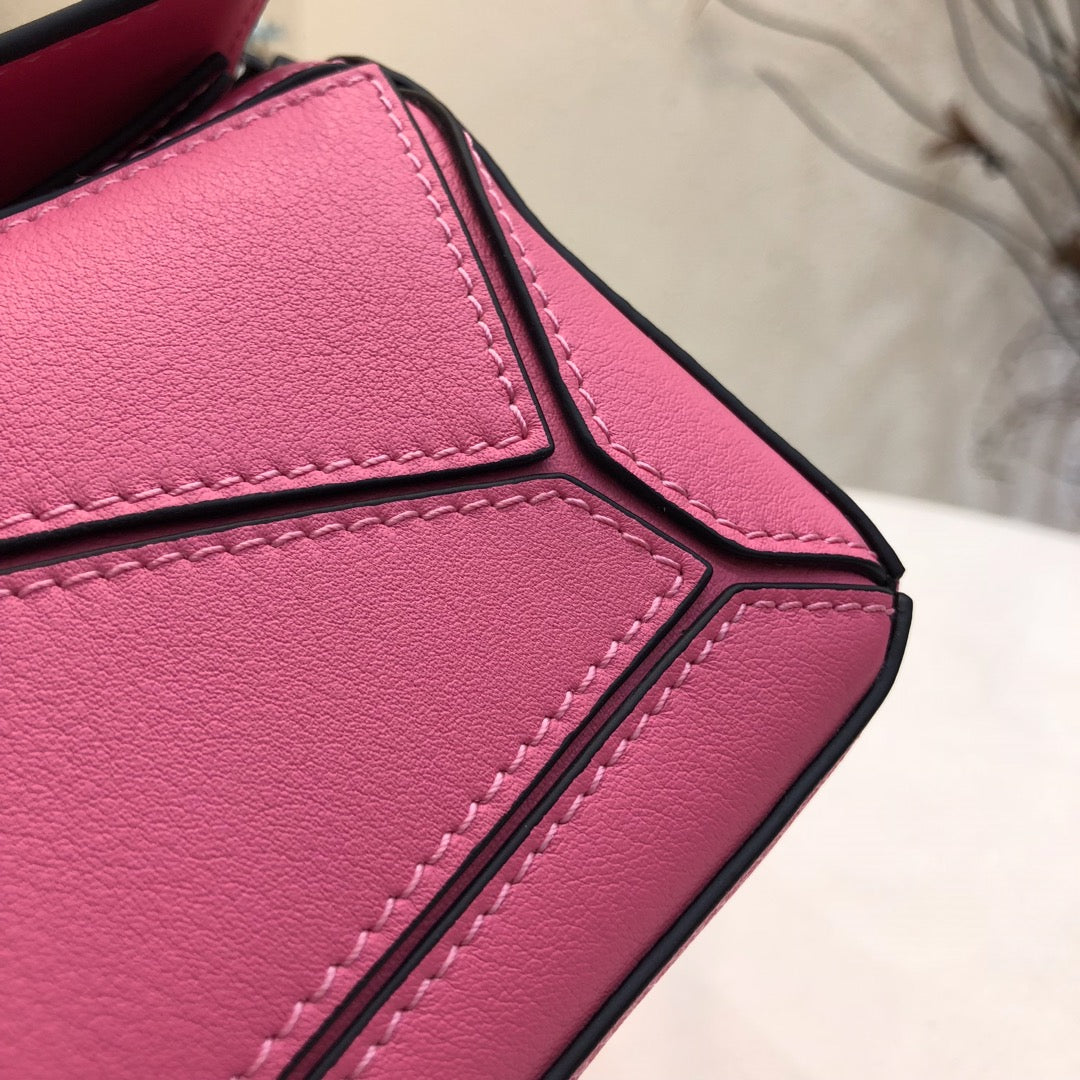 LOE MINI 18 PUZZLE BAG IN DEEP PINK CALFSKIN mysite