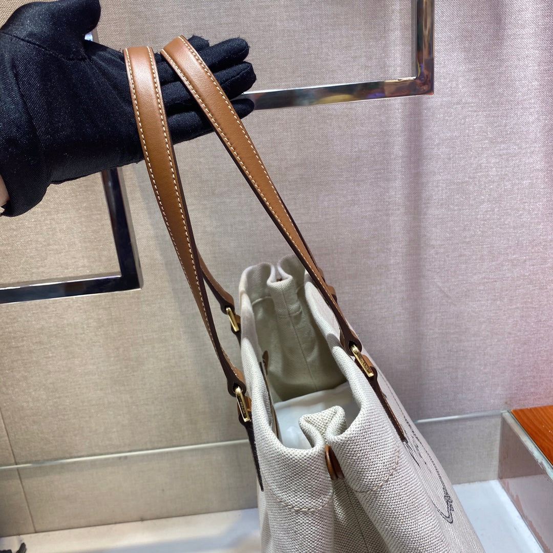 TOTE BAG 33 IN WHITE CANVAS AND BROWN CALFSKIN HANDLE mysite