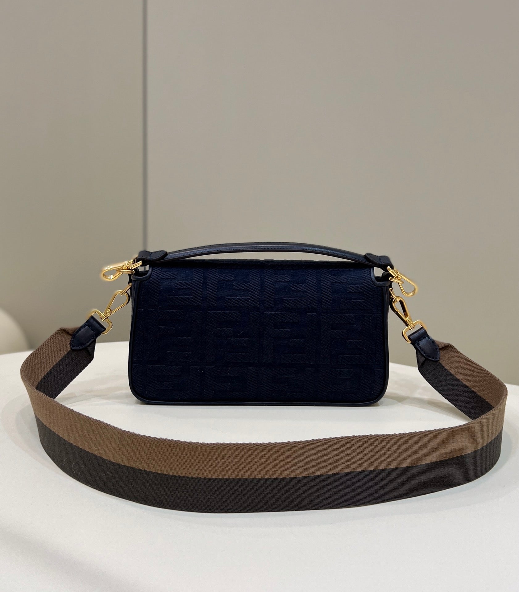 BAGUETTE WITH FF MOTIF 27 IN NAVY BLUE JACQUARD FABRIC GOLD HARDWARE mysite