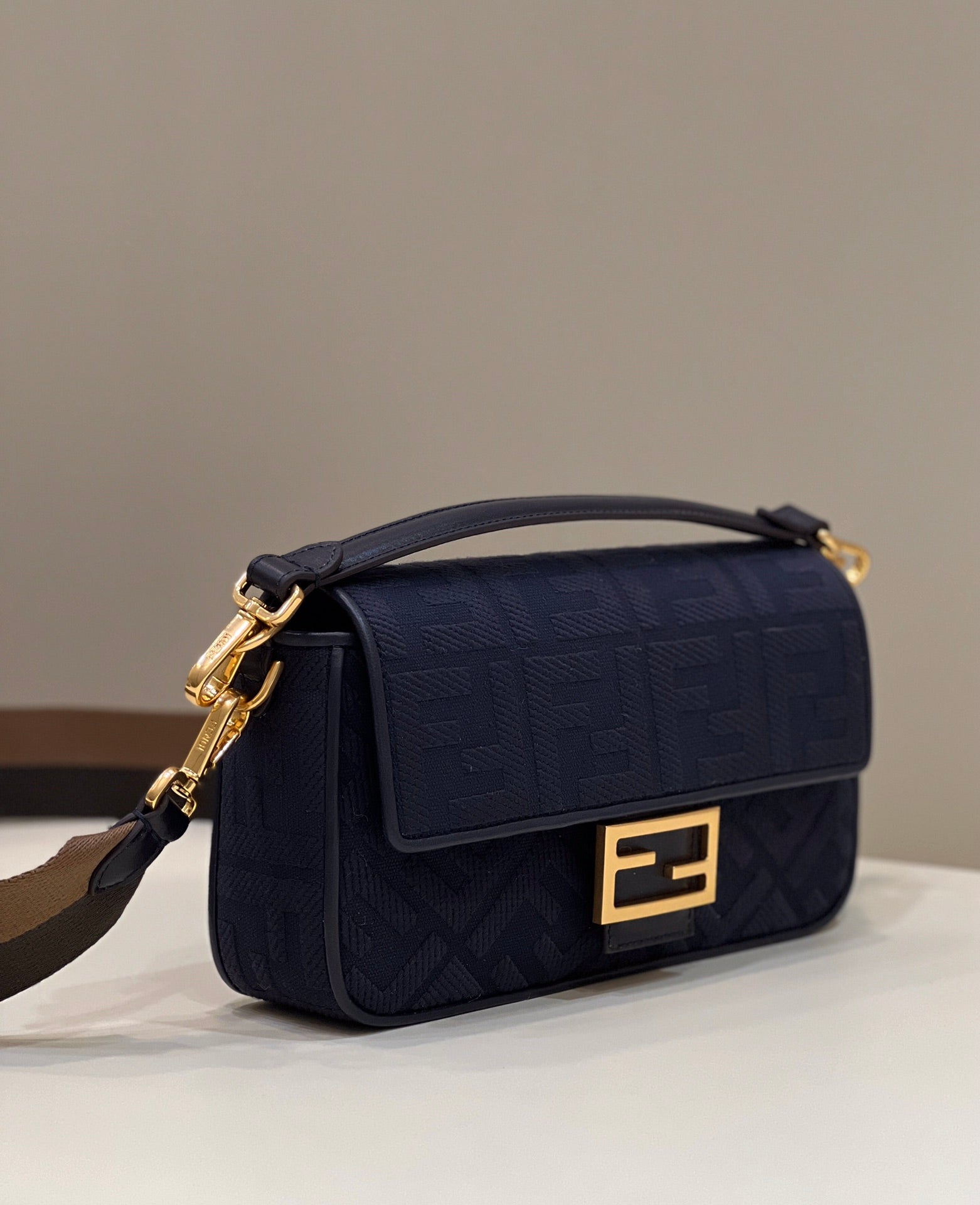 BAGUETTE WITH FF MOTIF 27 IN NAVY BLUE JACQUARD FABRIC GOLD HARDWARE mysite