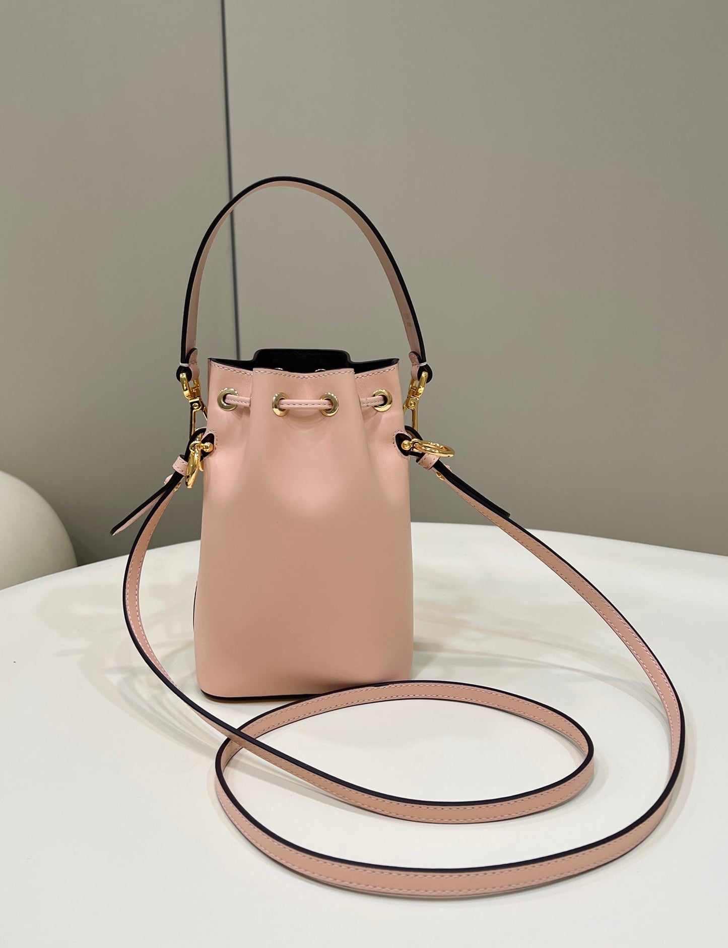 MON TRESOR MINI 18 BAG IN PEACHY PINK CALFSKIN FF WITH GOLD HARDWARE mysite
