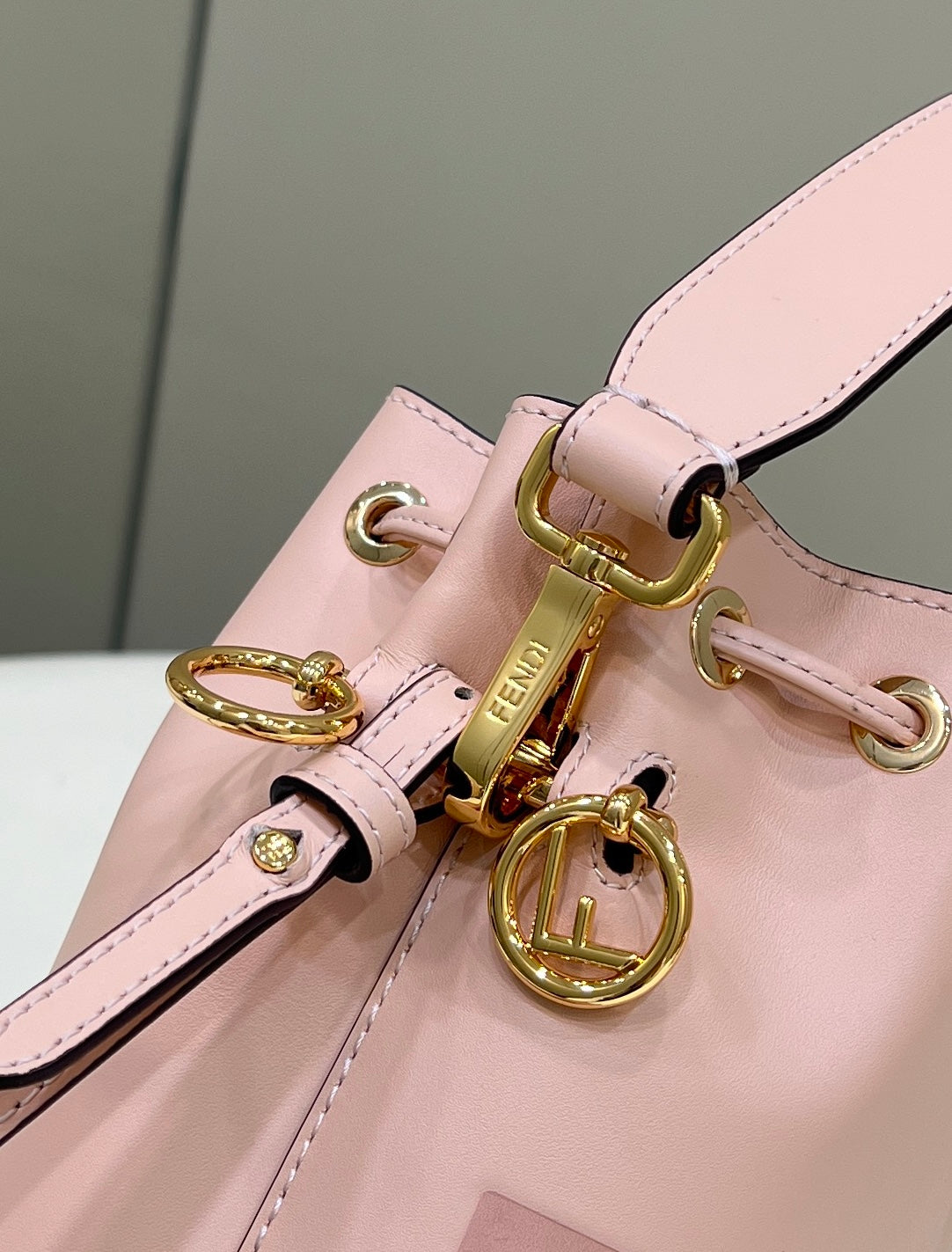 MON TRESOR MINI 18 BAG IN PEACHY PINK CALFSKIN FF WITH GOLD HARDWARE mysite