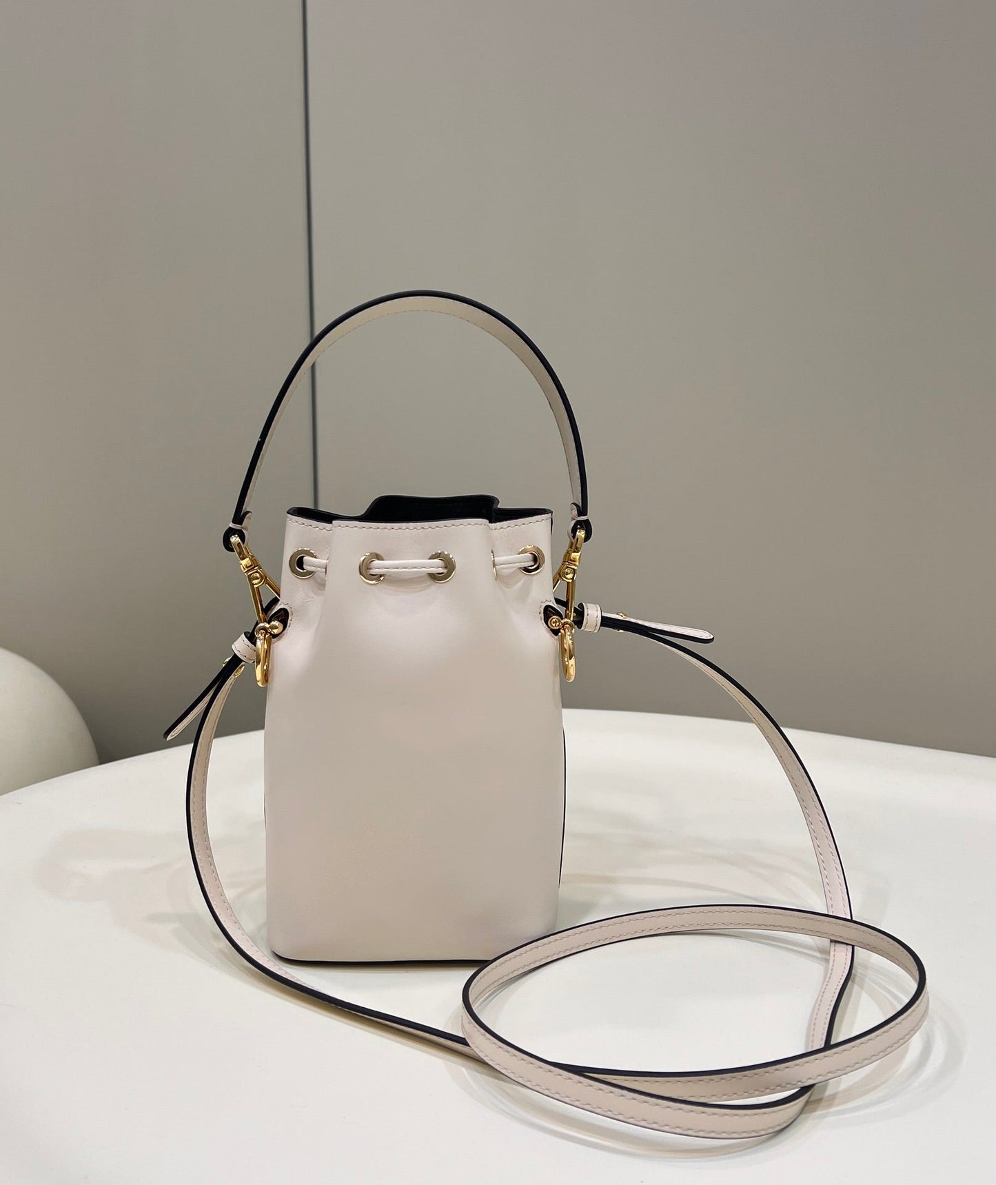 MON TRESOR MINI 18 BAG IN WHITE CALFSKIN FF WITH GOLD HARDWARE mysite