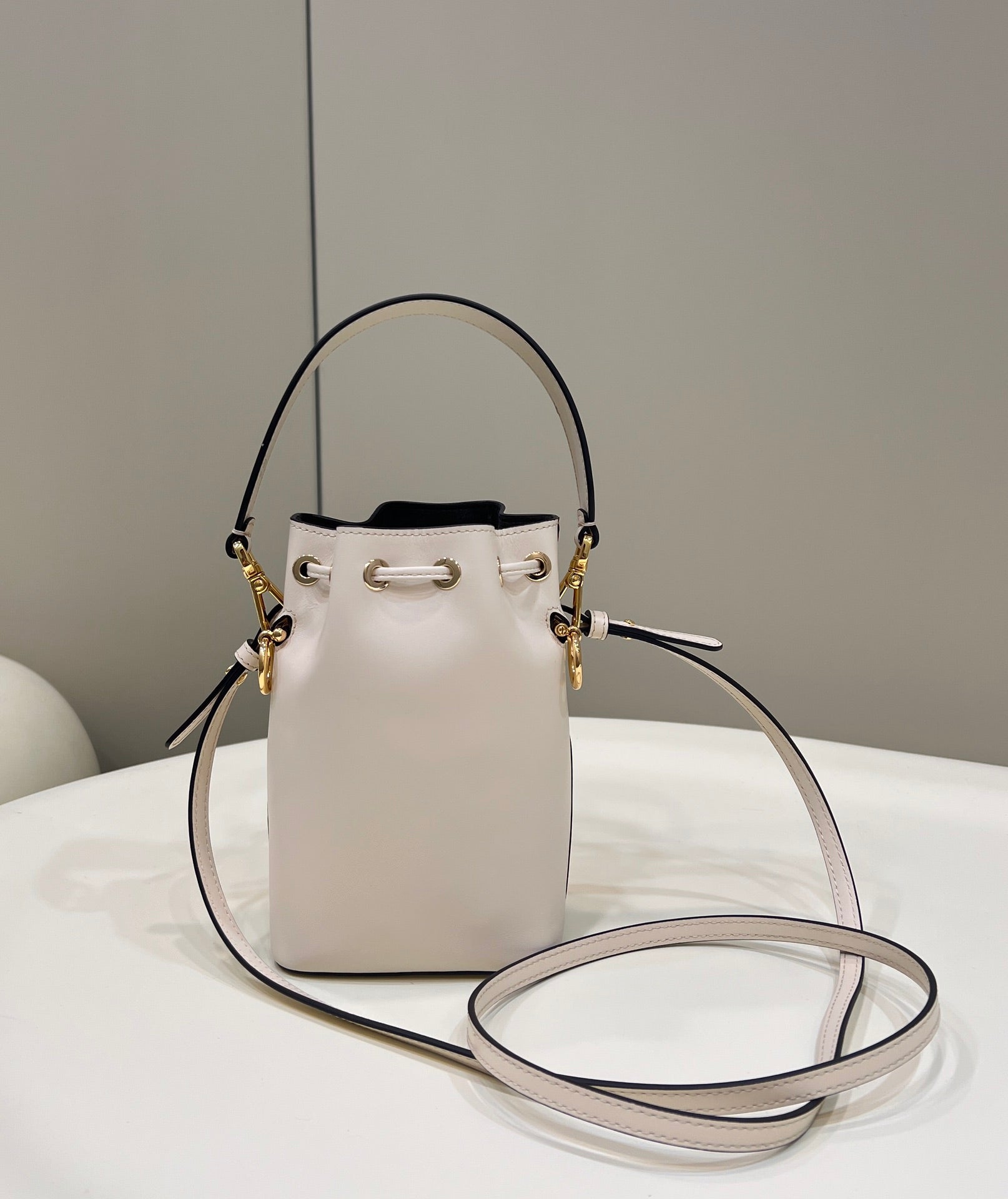 MON TRESOR MINI 18 BAG IN WHITE CALFSKIN FF WITH GOLD HARDWARE mysite