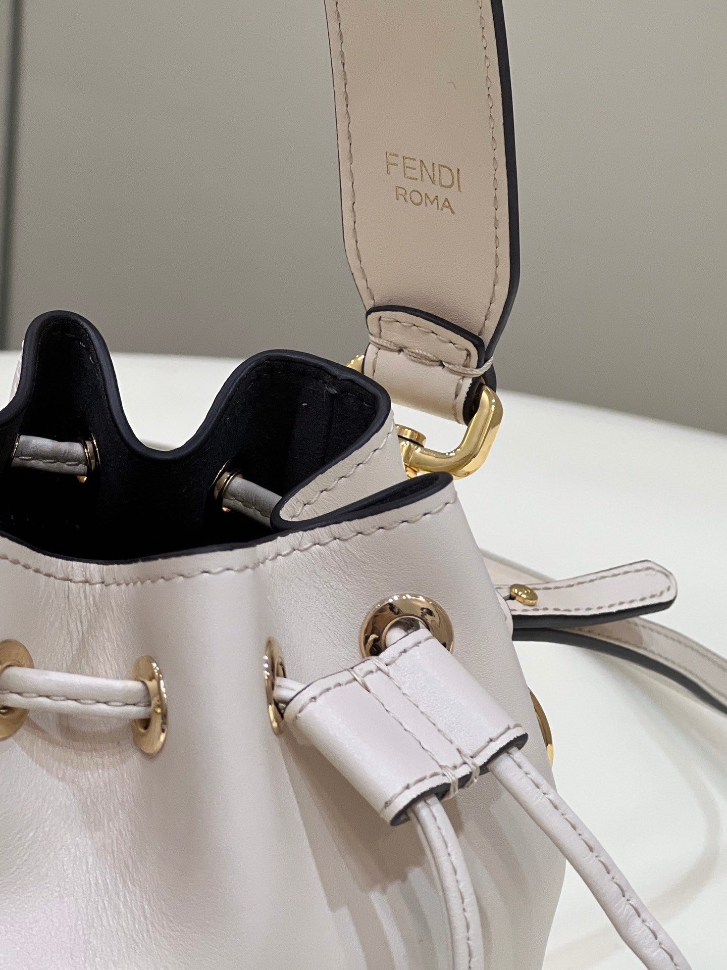 MON TRESOR MINI 18 BAG IN WHITE CALFSKIN FF WITH GOLD HARDWARE mysite
