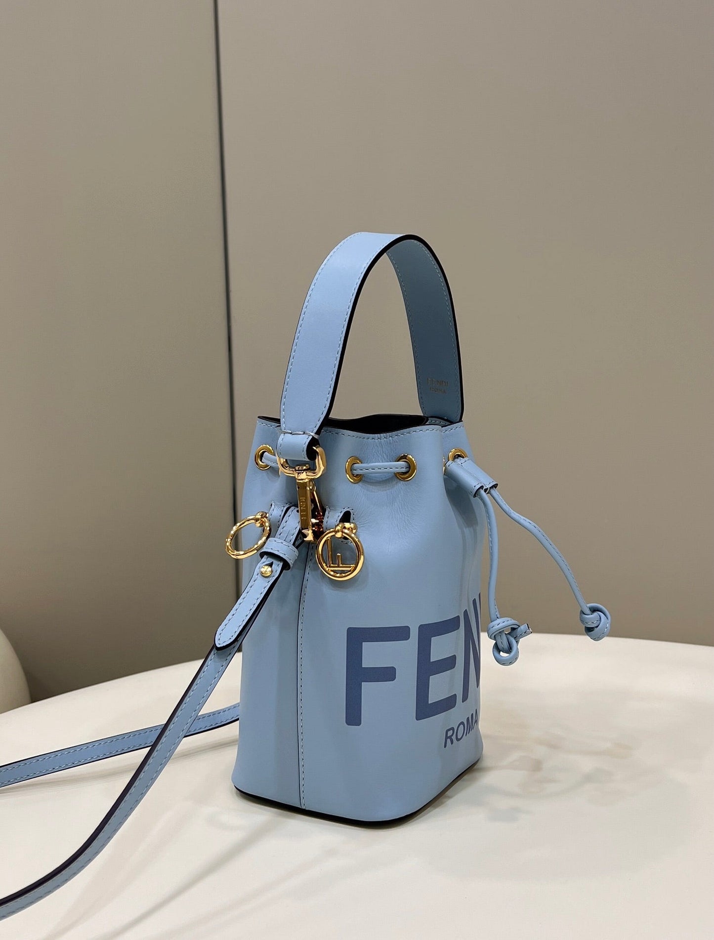 MON TRESOR MINI 18 BAG IN LIGHT BLUE CALFSKIN FF WITH GOLD HARDWARE mysite