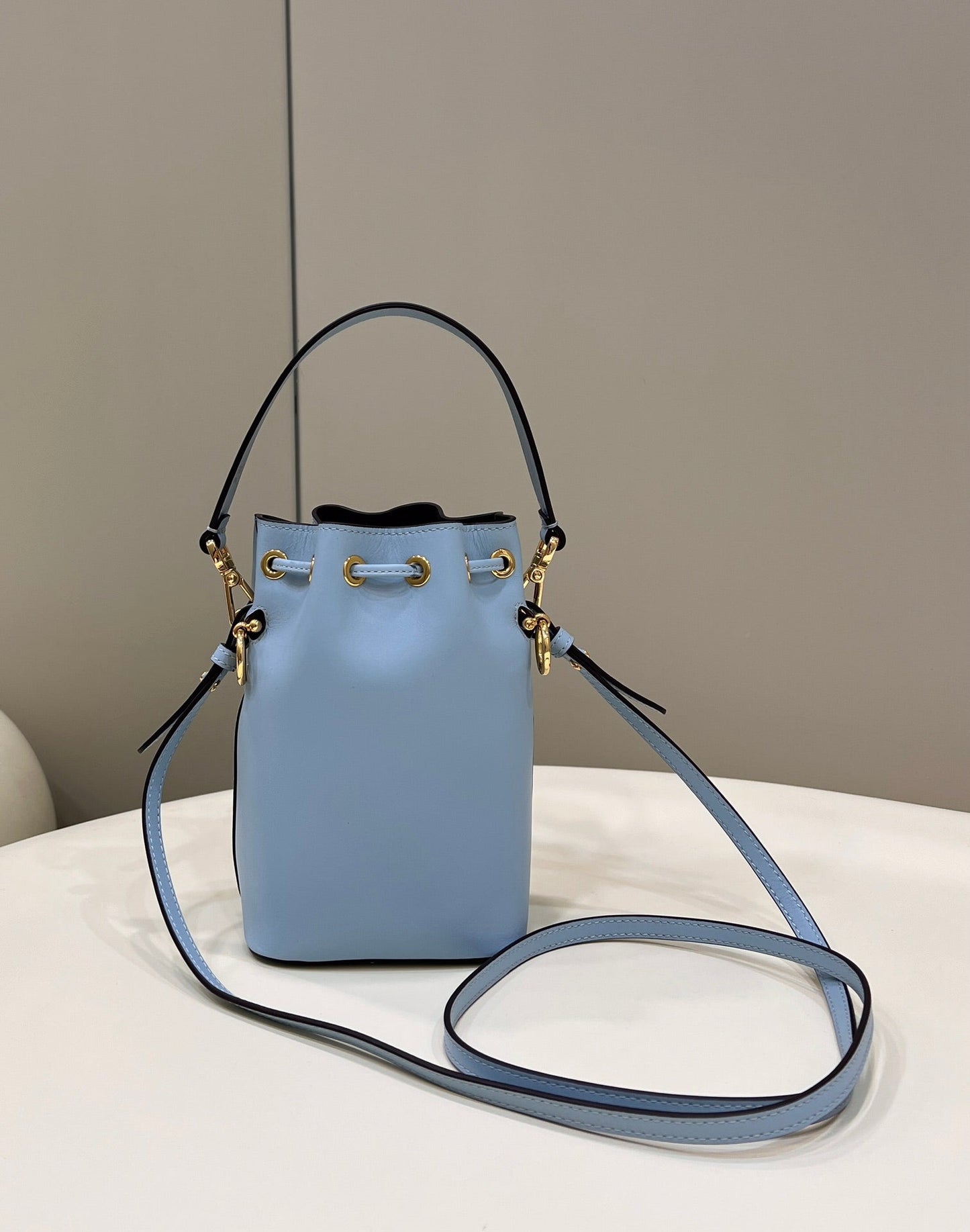 MON TRESOR MINI 18 BAG IN LIGHT BLUE CALFSKIN FF WITH GOLD HARDWARE mysite