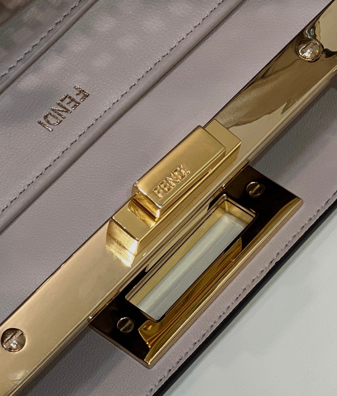 PEEKABOO ISEEU 34 IN WHITE PERFORATED CALFSKIN GOLD HARDWARE mysite