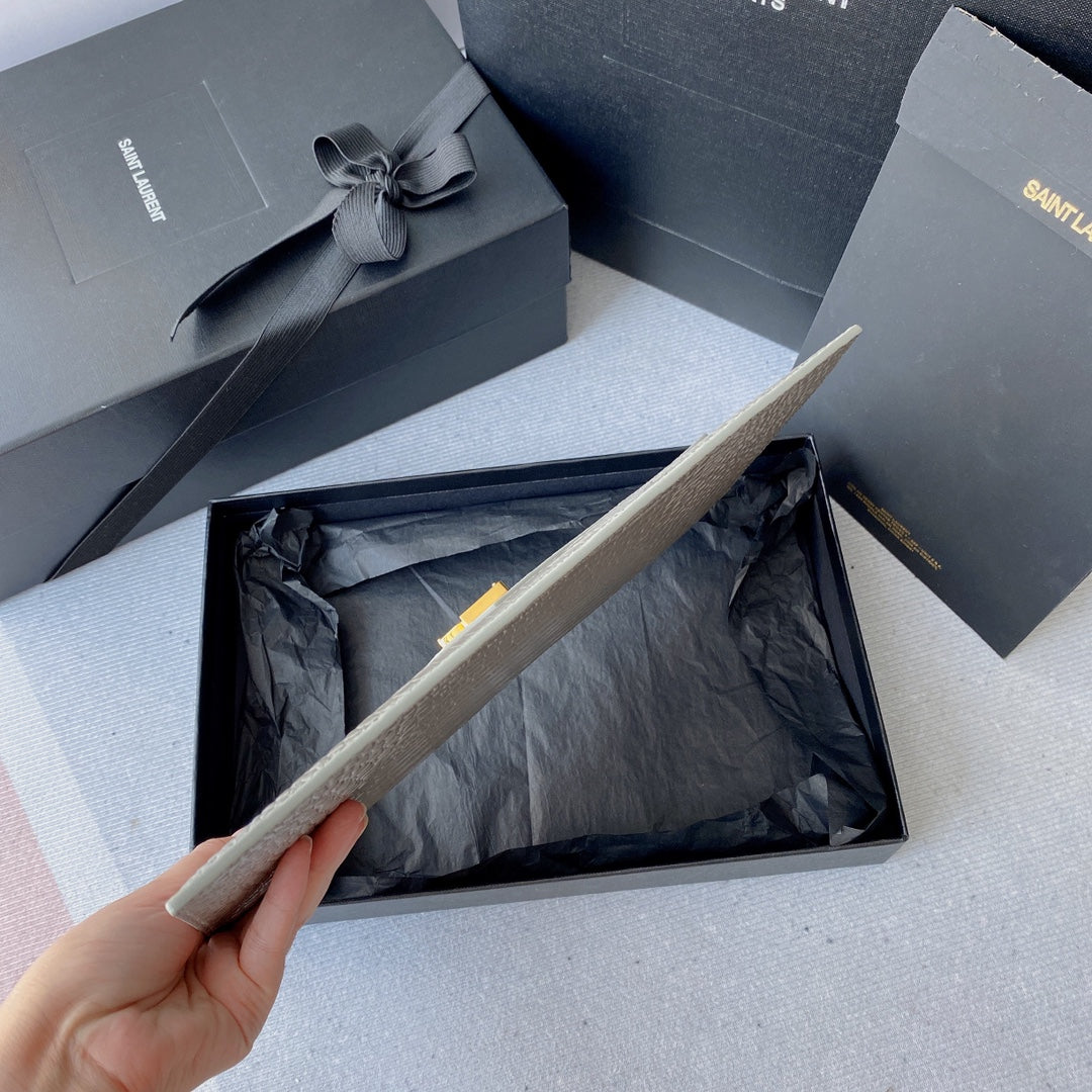 UPTOWN POUCH 27 IN PASTEL GRAY CROCODILE-EMBOSSED SHINY CALFSKIN GOLD LOGO mysite