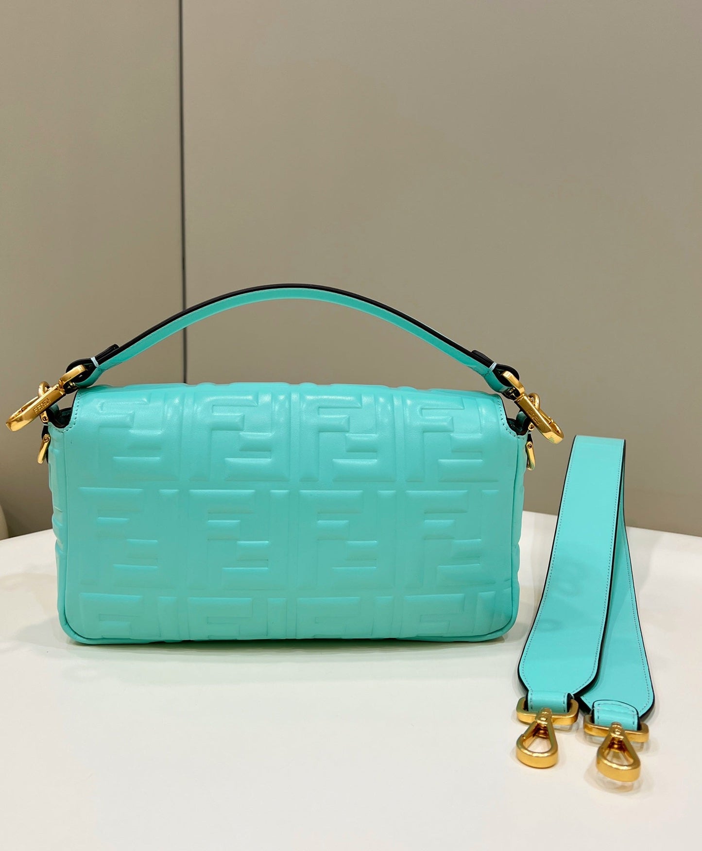 BAGUETTE WITH FF MOTIF 27 IN TURQUOISE SOFT LAMBSKIN GOLD HARDWARE mysite