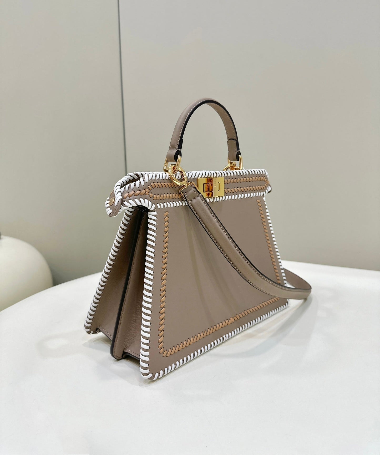 PEEKABOO ISEEU 27 IN MEDIUM BROWN INTERLACED CALFSKIN GOLD HARDWARE mysite