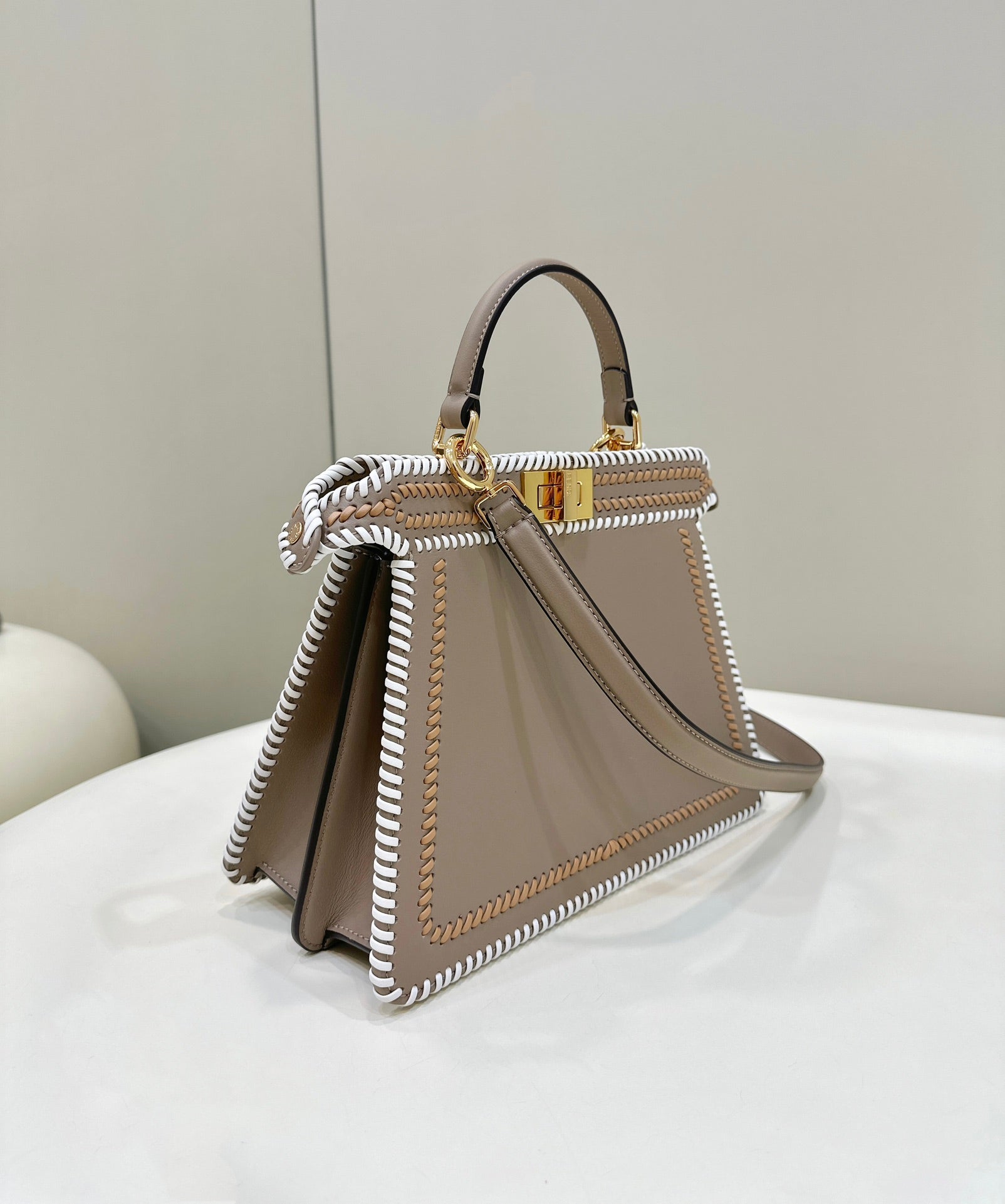 PEEKABOO ISEEU 27 IN MEDIUM BROWN INTERLACED CALFSKIN GOLD HARDWARE mysite