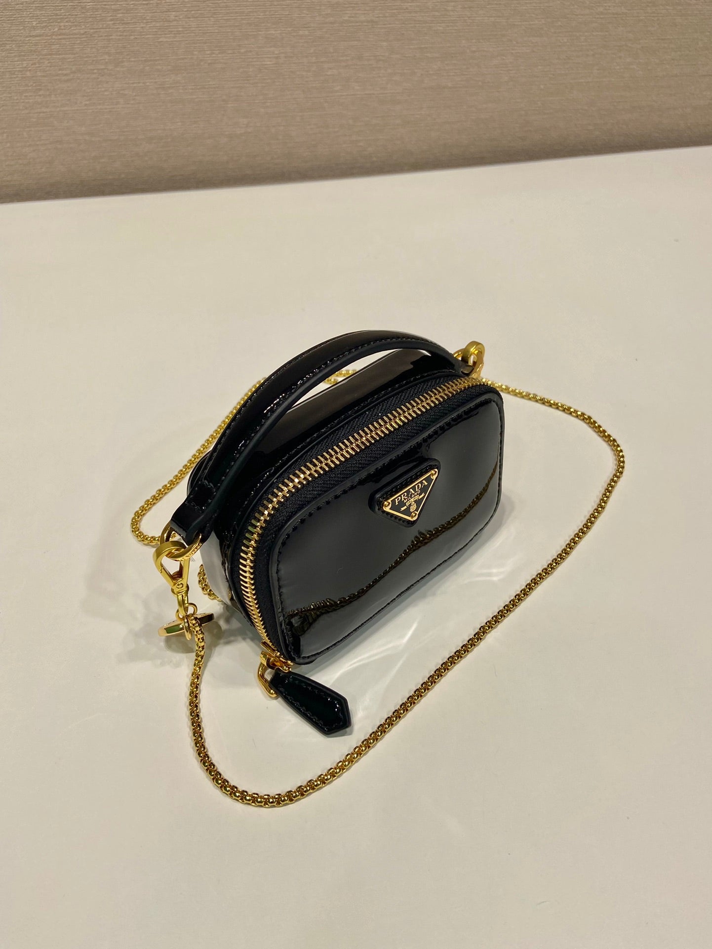 MINI HAND BAG 11 WITH GOLD STRAP IN BLACK PATENT CALFSKIN mysite