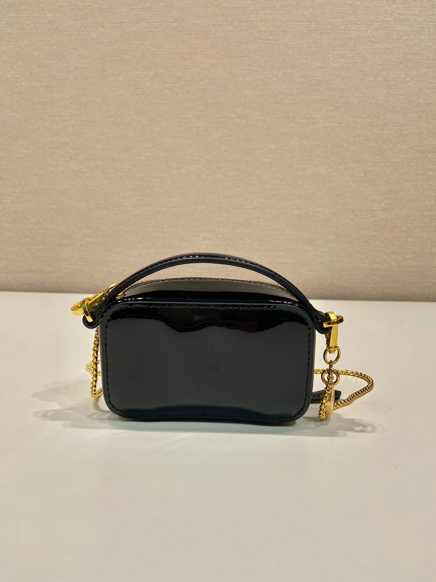 MINI HAND BAG 11 WITH GOLD STRAP IN BLACK PATENT CALFSKIN mysite