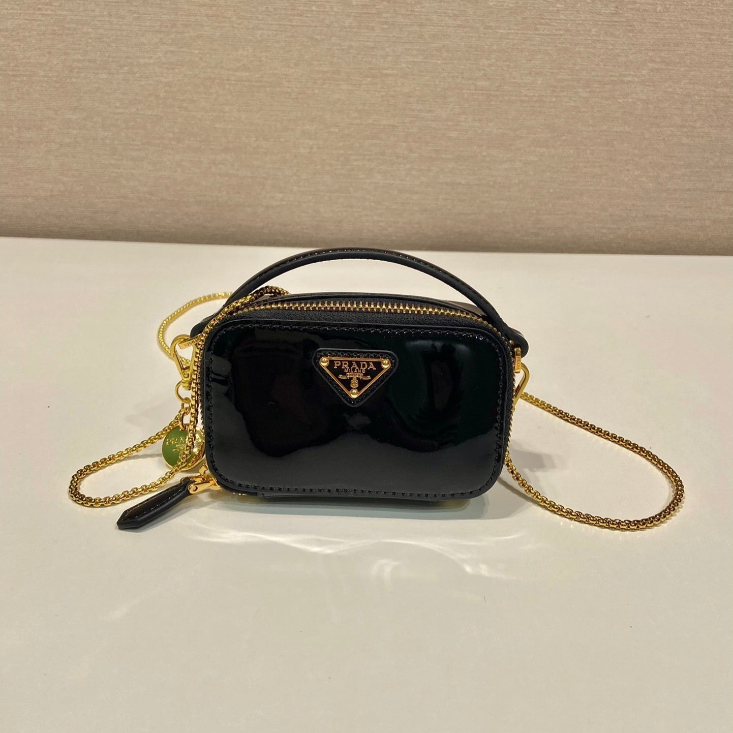 MINI HAND BAG 11 WITH GOLD STRAP IN BLACK PATENT CALFSKIN mysite