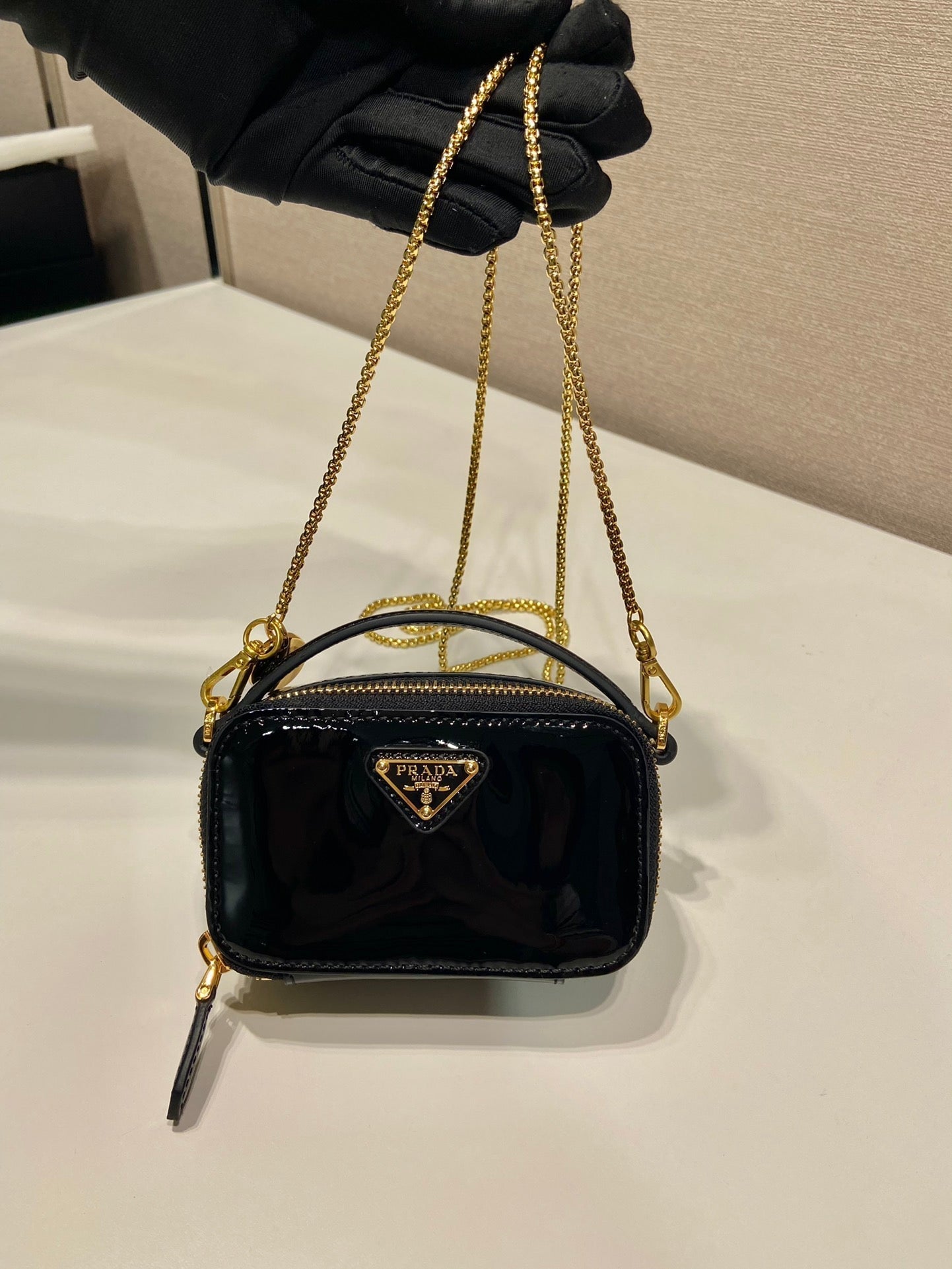 MINI HAND BAG 11 WITH GOLD STRAP IN BLACK PATENT CALFSKIN mysite