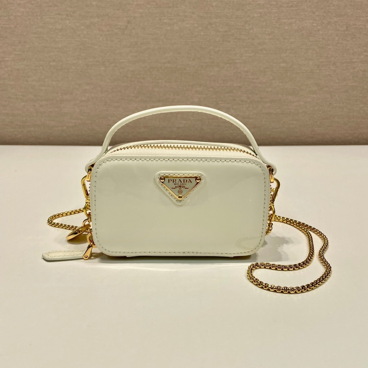 MINI HAND BAG 11 WITH GOLD STRAP IN WHITE PATENT CALFSKIN mysite