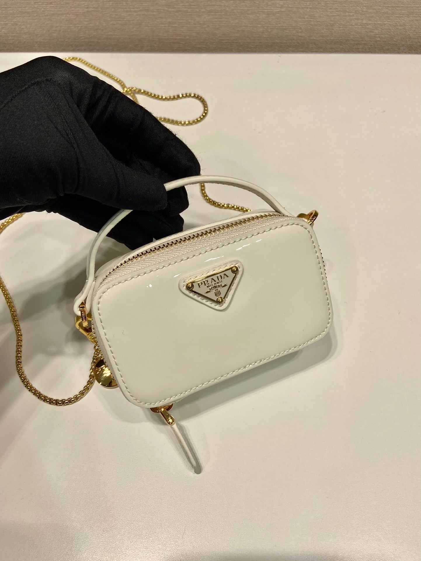 MINI HAND BAG 11 WITH GOLD STRAP IN WHITE PATENT CALFSKIN mysite