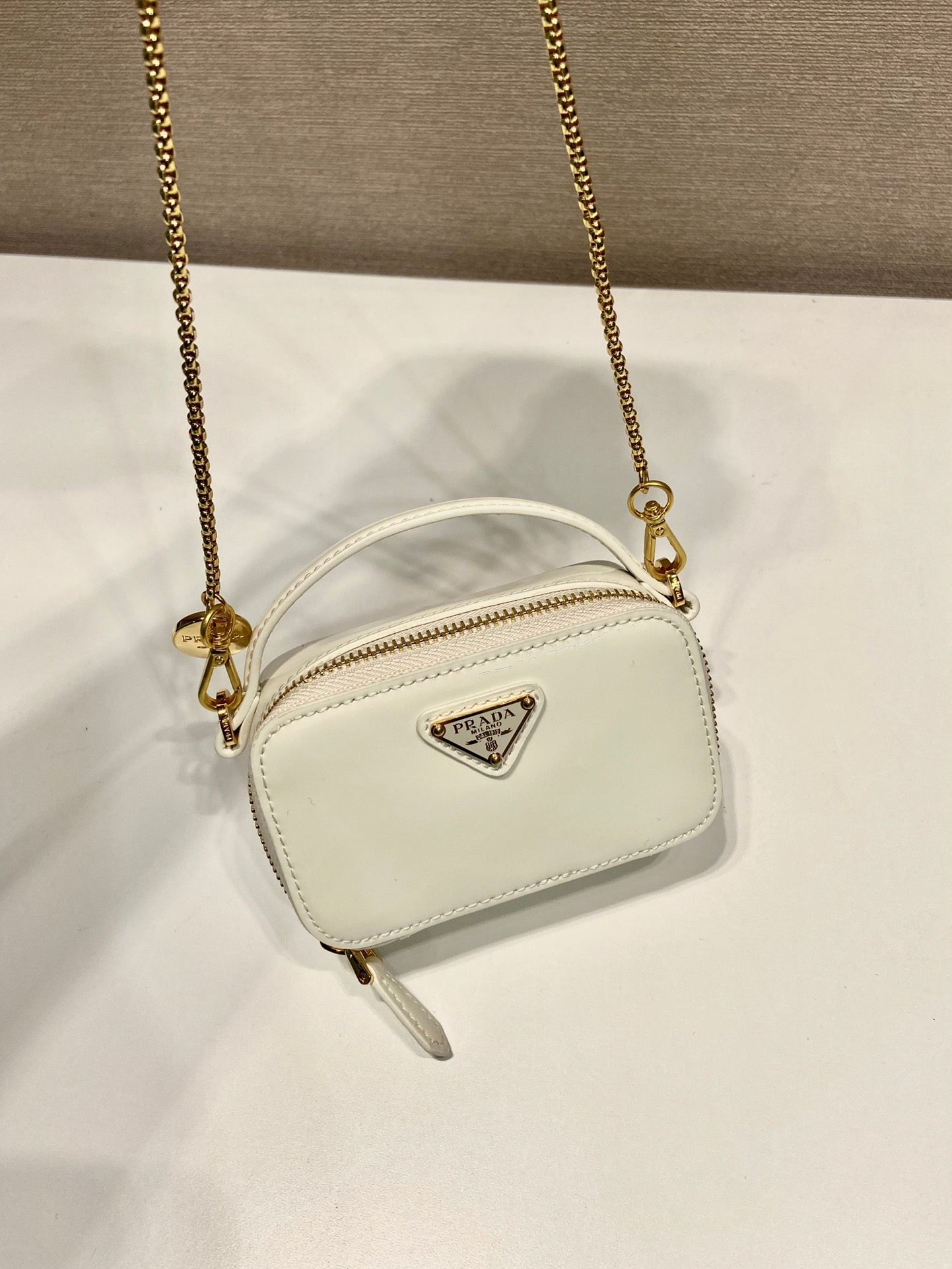 MINI HAND BAG 11 WITH GOLD STRAP IN WHITE PATENT CALFSKIN mysite