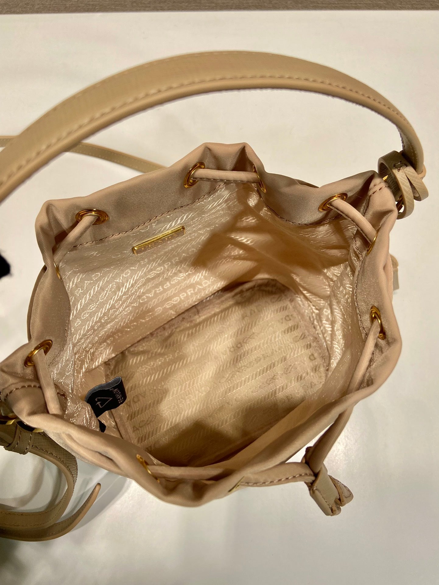 BUCKET BAG 19 IN BEIGE RE-NYLON AND SAFFIANO LEATHER HANDLE mysite
