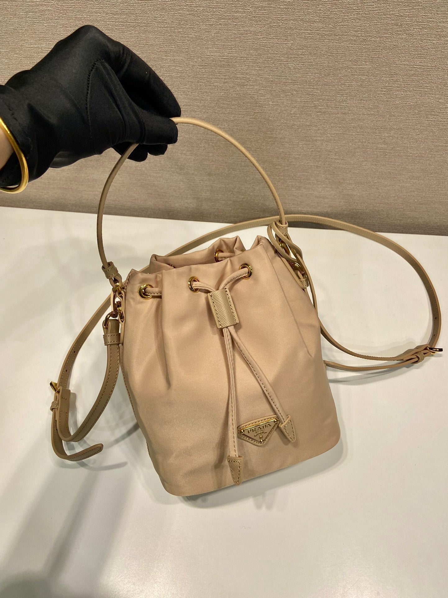 BUCKET BAG 19 IN BEIGE RE-NYLON AND SAFFIANO LEATHER HANDLE mysite