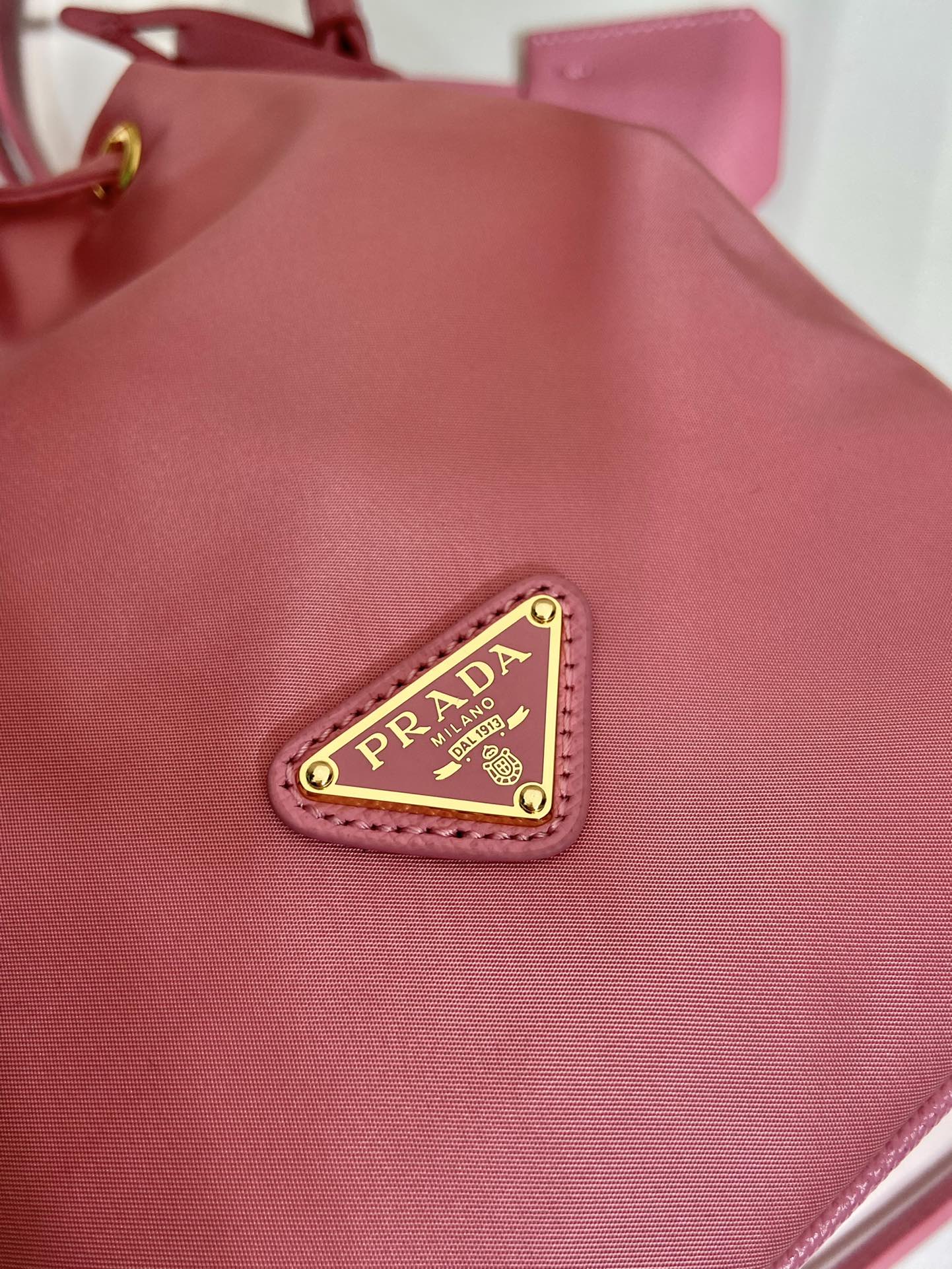 BUCKET BAG 19 IN CANDY PINK RE-NYLON AND SAFFIANO LEATHER HANDLE mysite