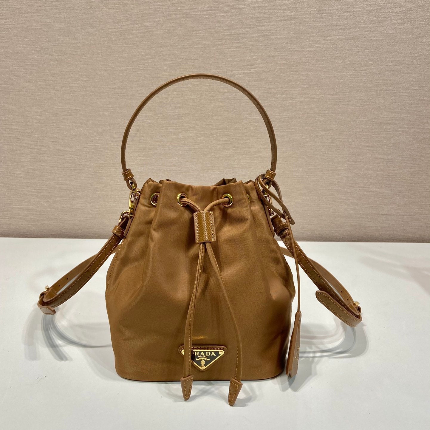 BUCKET BAG 19 IN RUSSET BROWN RE-NYLON AND CALFSKIN HANDLE mysite