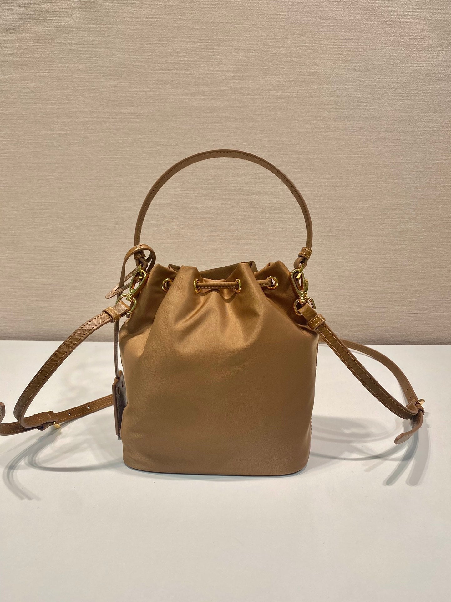 BUCKET BAG 19 IN RUSSET BROWN RE-NYLON AND CALFSKIN HANDLE mysite