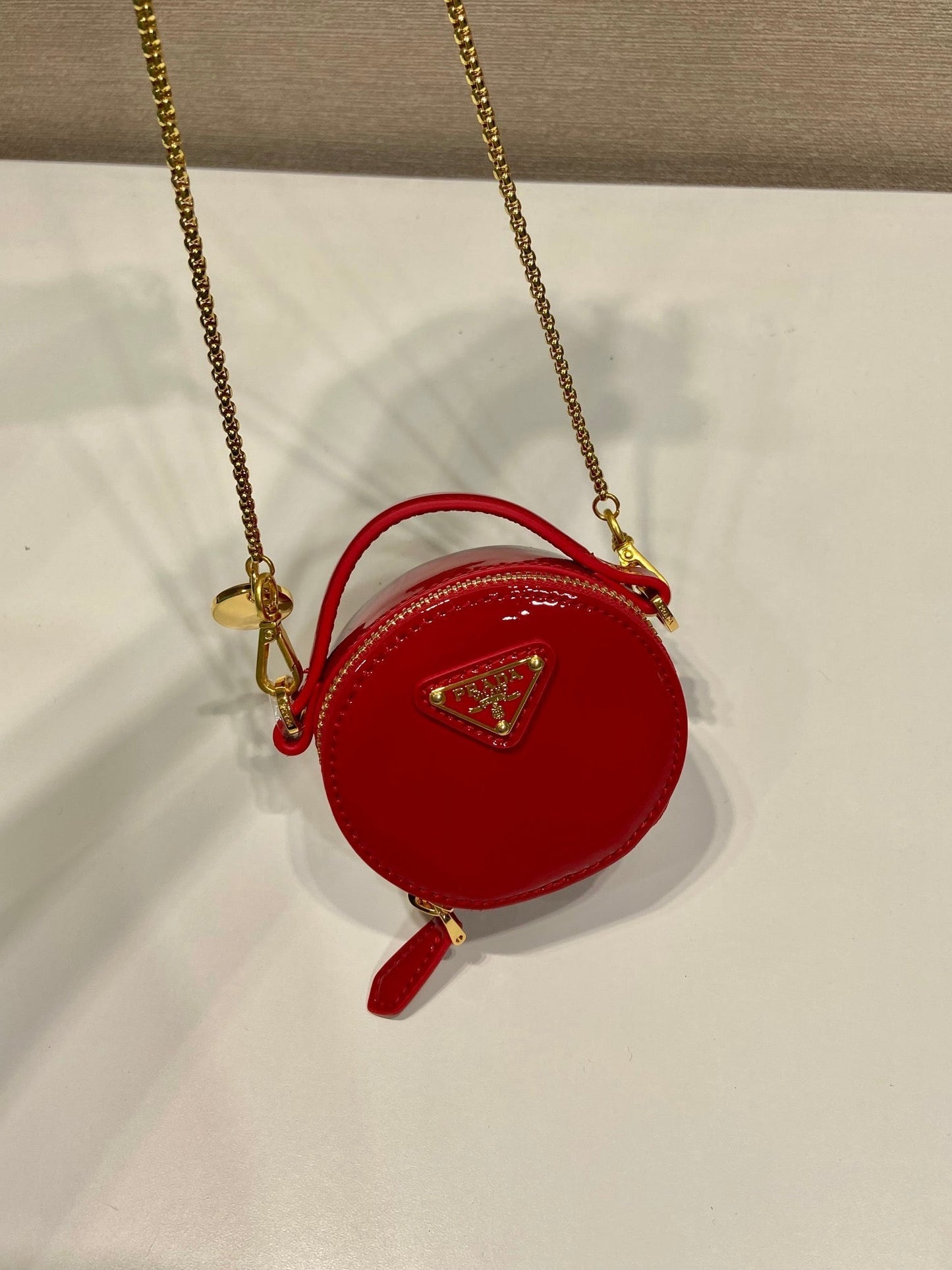 MINI ROUND BAG 8 IN RED GLOSSY CALFSKIN GOLD HARDWARE mysite