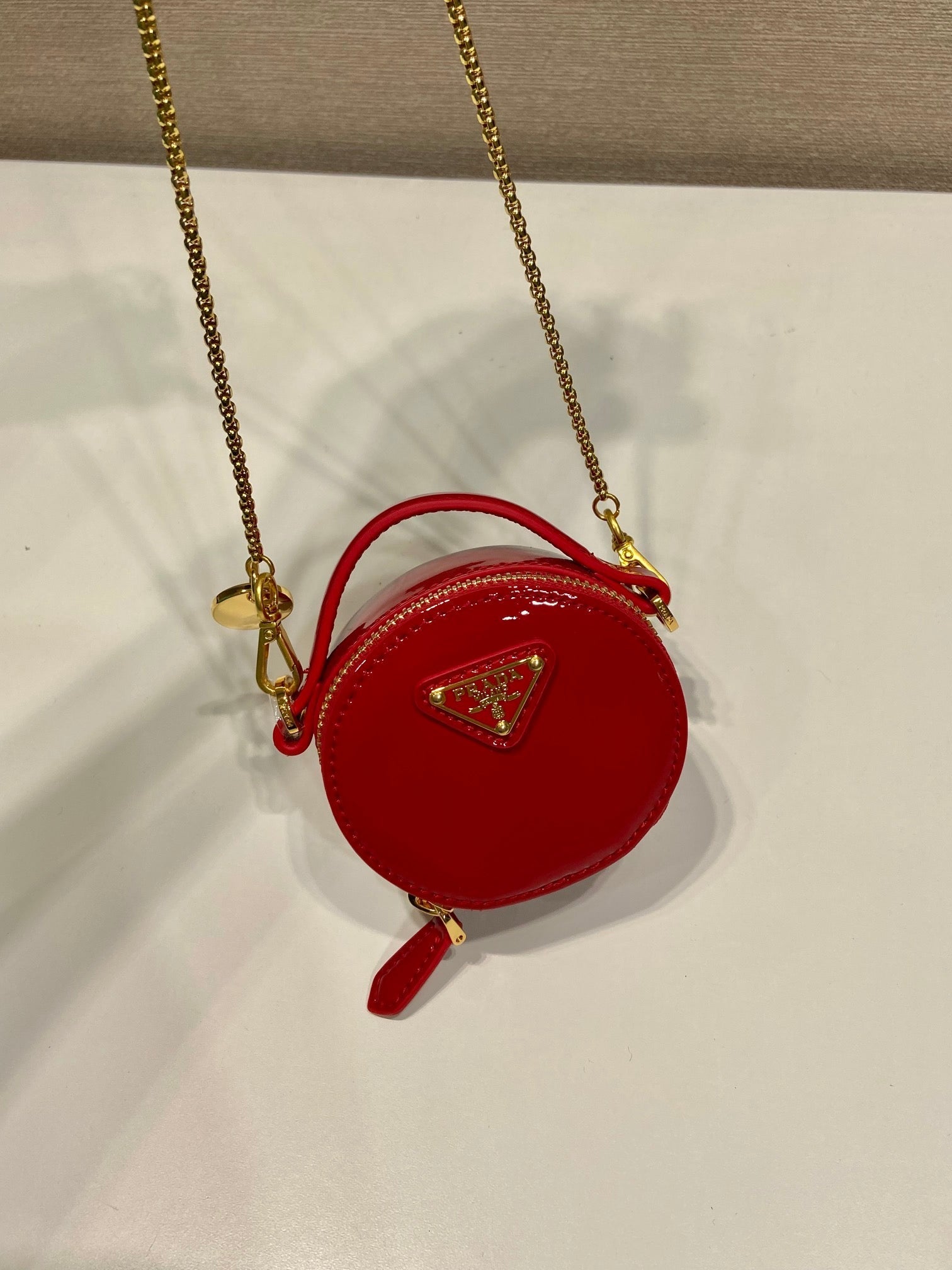 MINI ROUND BAG 8 IN RED GLOSSY CALFSKIN GOLD HARDWARE mysite