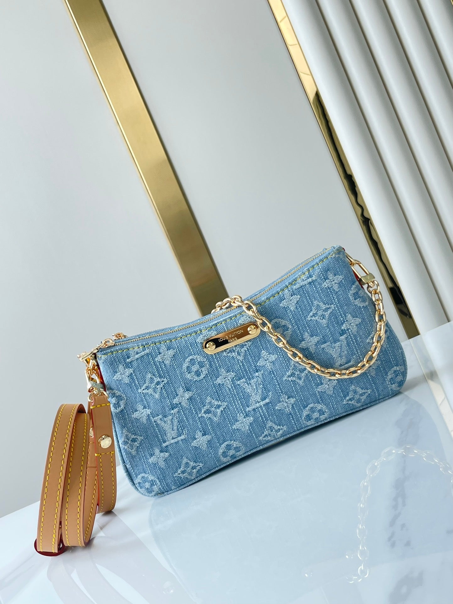 LIV POCHETTE 24 IN BLUE MONOGRAM DENIM GOLD HARDWARE mysite