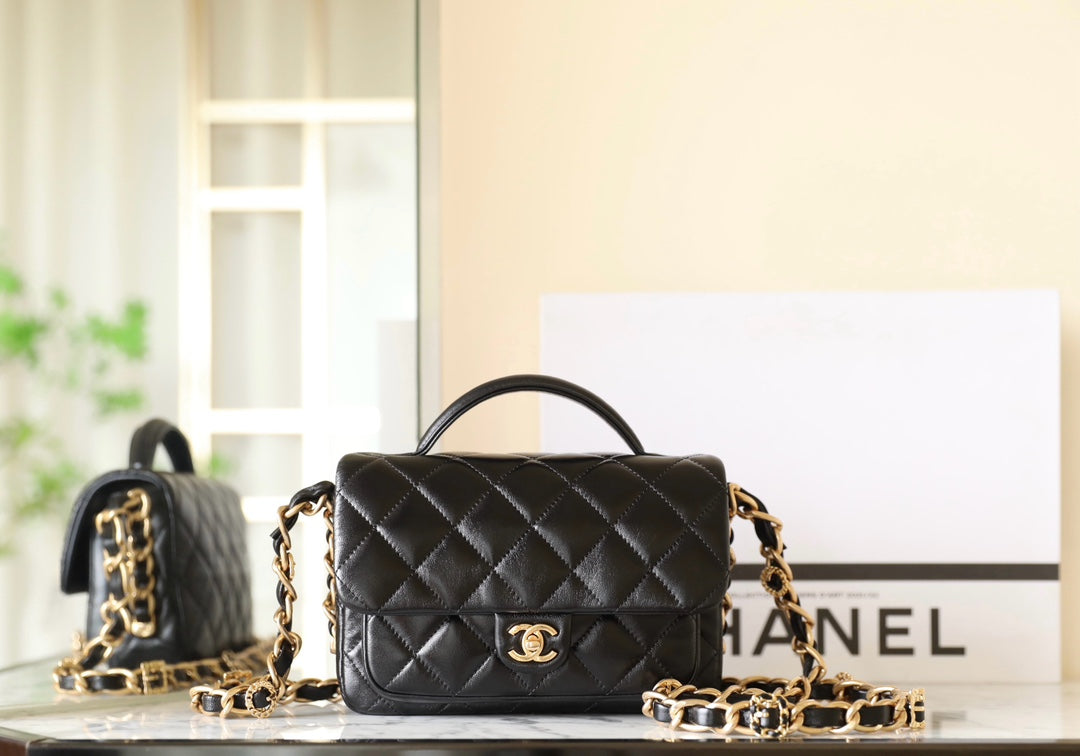 cc 24a flap bag 20cm top handle black  lambskin gold hardware