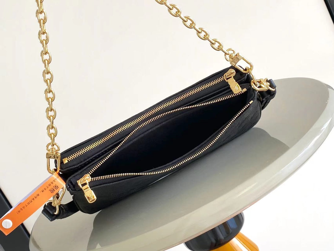 LIV POCHETTE 24 IN BLACK MONOGRAM EMPREINTE LEATHER GOLD HARDWARE mysite