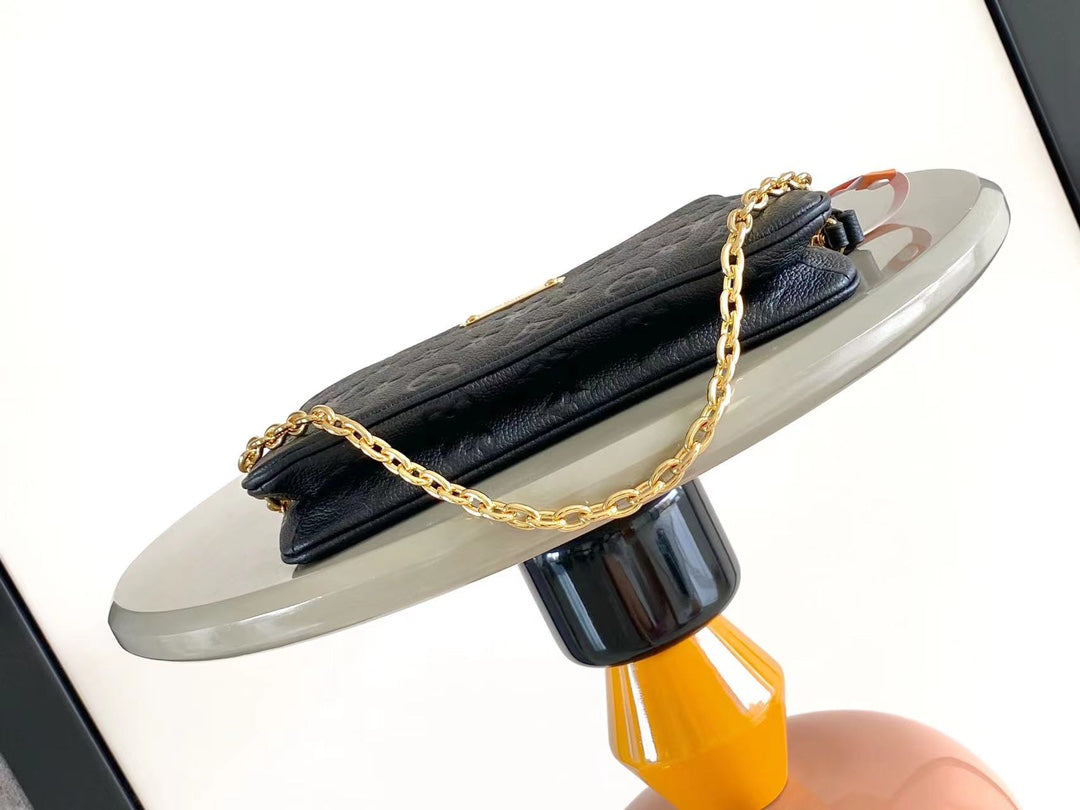 LIV POCHETTE 24 IN BLACK MONOGRAM EMPREINTE LEATHER GOLD HARDWARE mysite