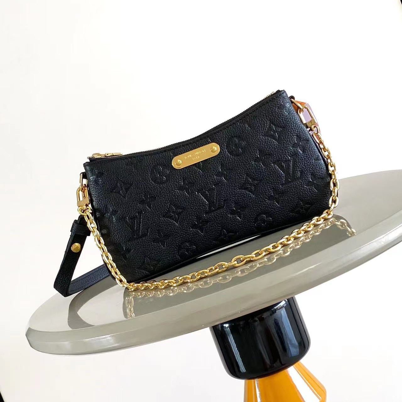 LIV POCHETTE 24 IN BLACK MONOGRAM EMPREINTE LEATHER GOLD HARDWARE mysite