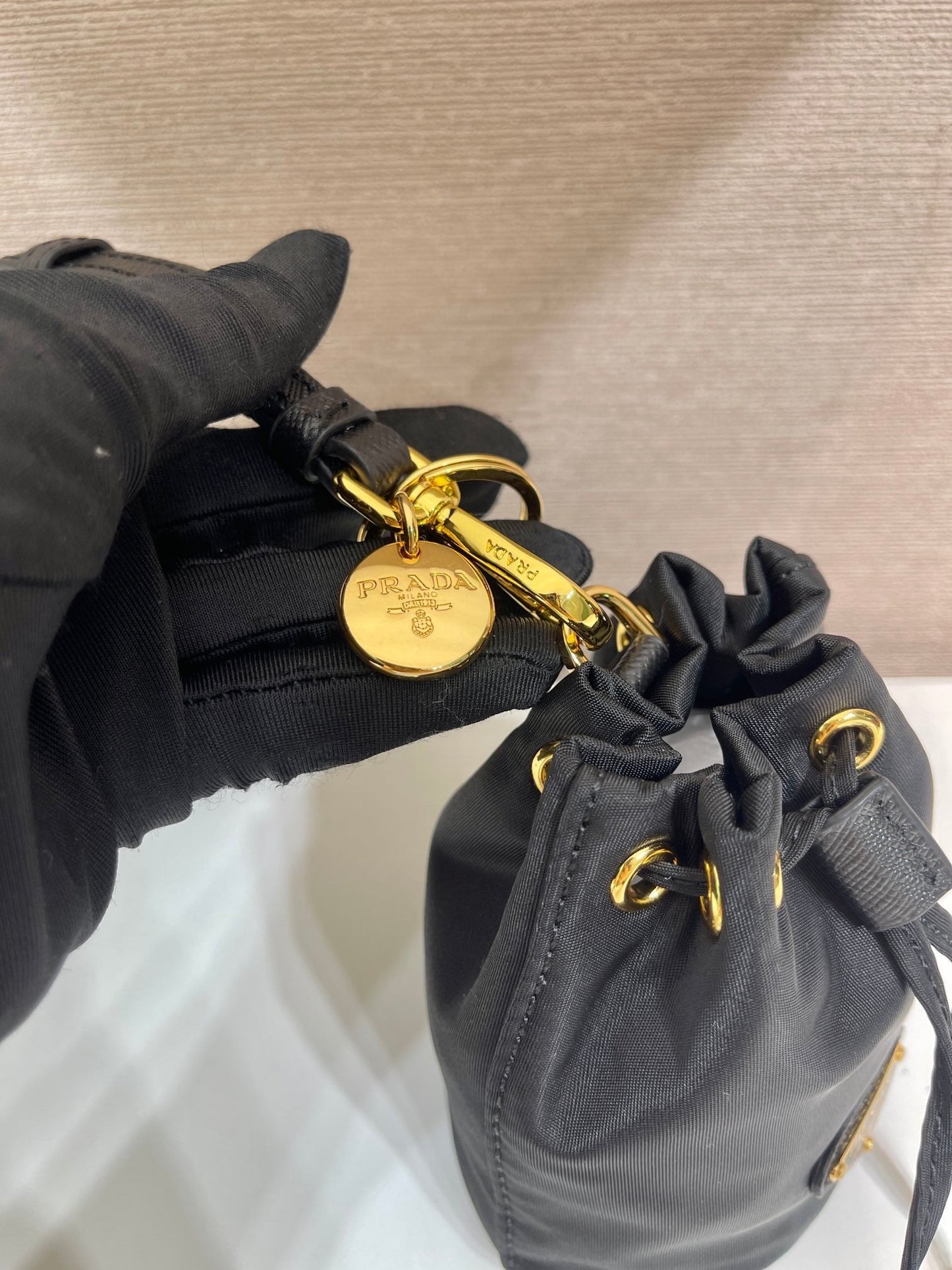 MINI BUCKET BAG 10 IN BLACK RE-NYLON AND SAFFIANO LEATHER STRAP mysite