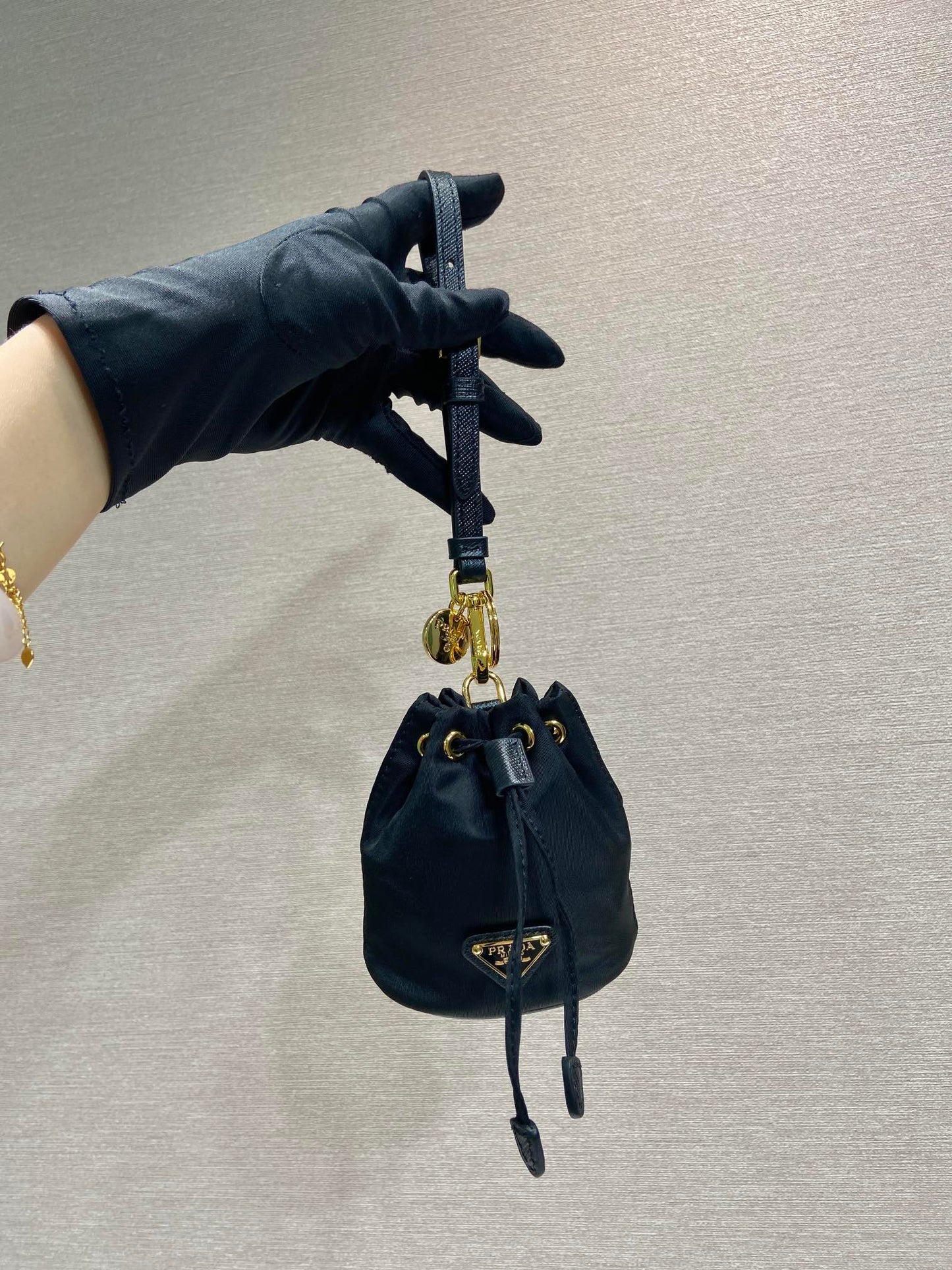 MINI BUCKET BAG 10 IN BLACK RE-NYLON AND SAFFIANO LEATHER STRAP mysite