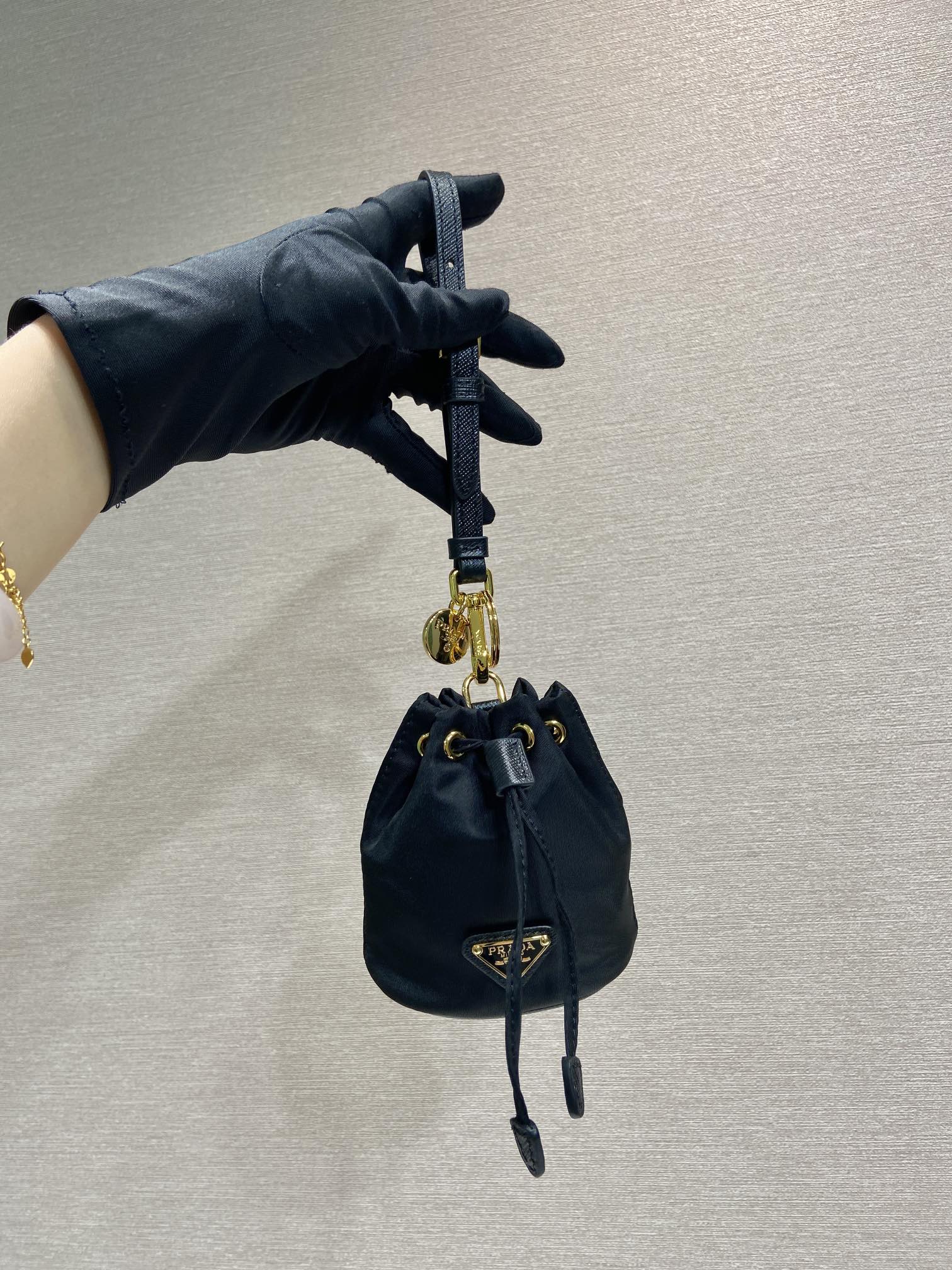 MINI BUCKET BAG 10 IN BLACK RE-NYLON AND SAFFIANO LEATHER STRAP mysite