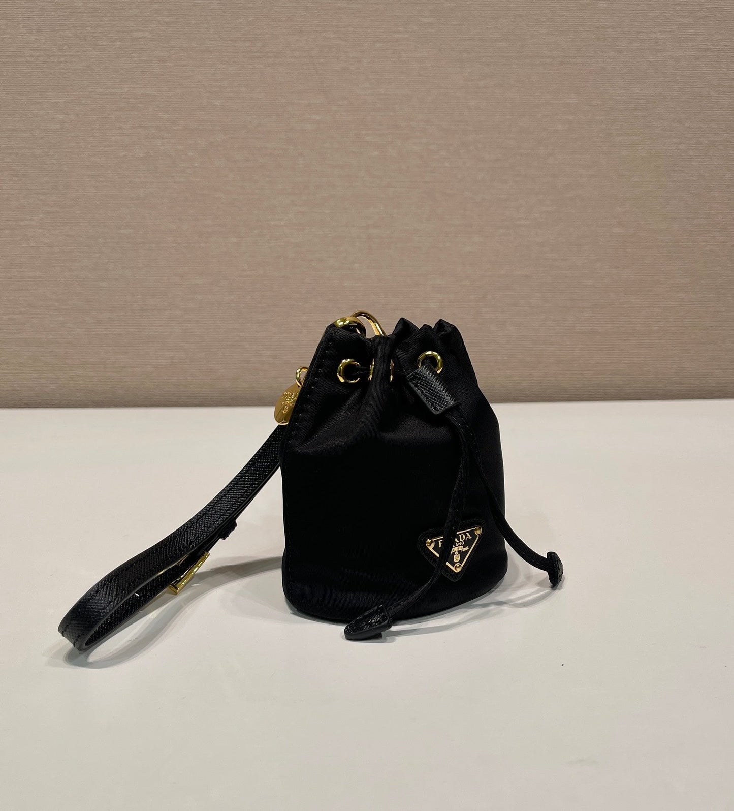 MINI BUCKET BAG 10 IN BLACK RE-NYLON AND SAFFIANO LEATHER STRAP mysite