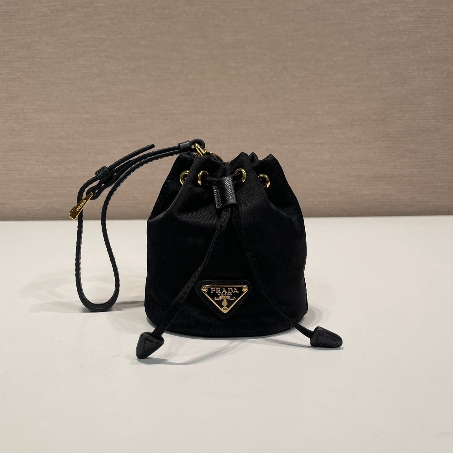 MINI BUCKET BAG 10 IN BLACK RE-NYLON AND SAFFIANO LEATHER STRAP mysite