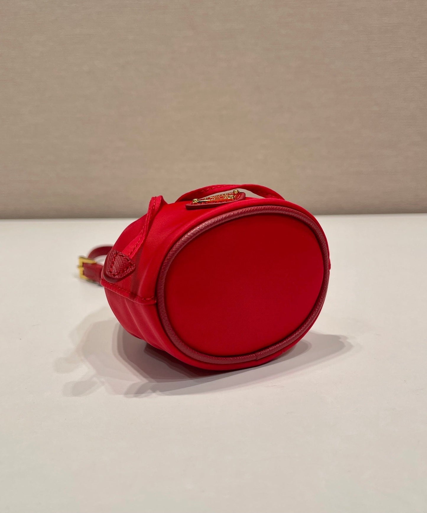 MINI BUCKET BAG 10 IN RED RE-NYLON AND SAFFIANO LEATHER STRAP mysite
