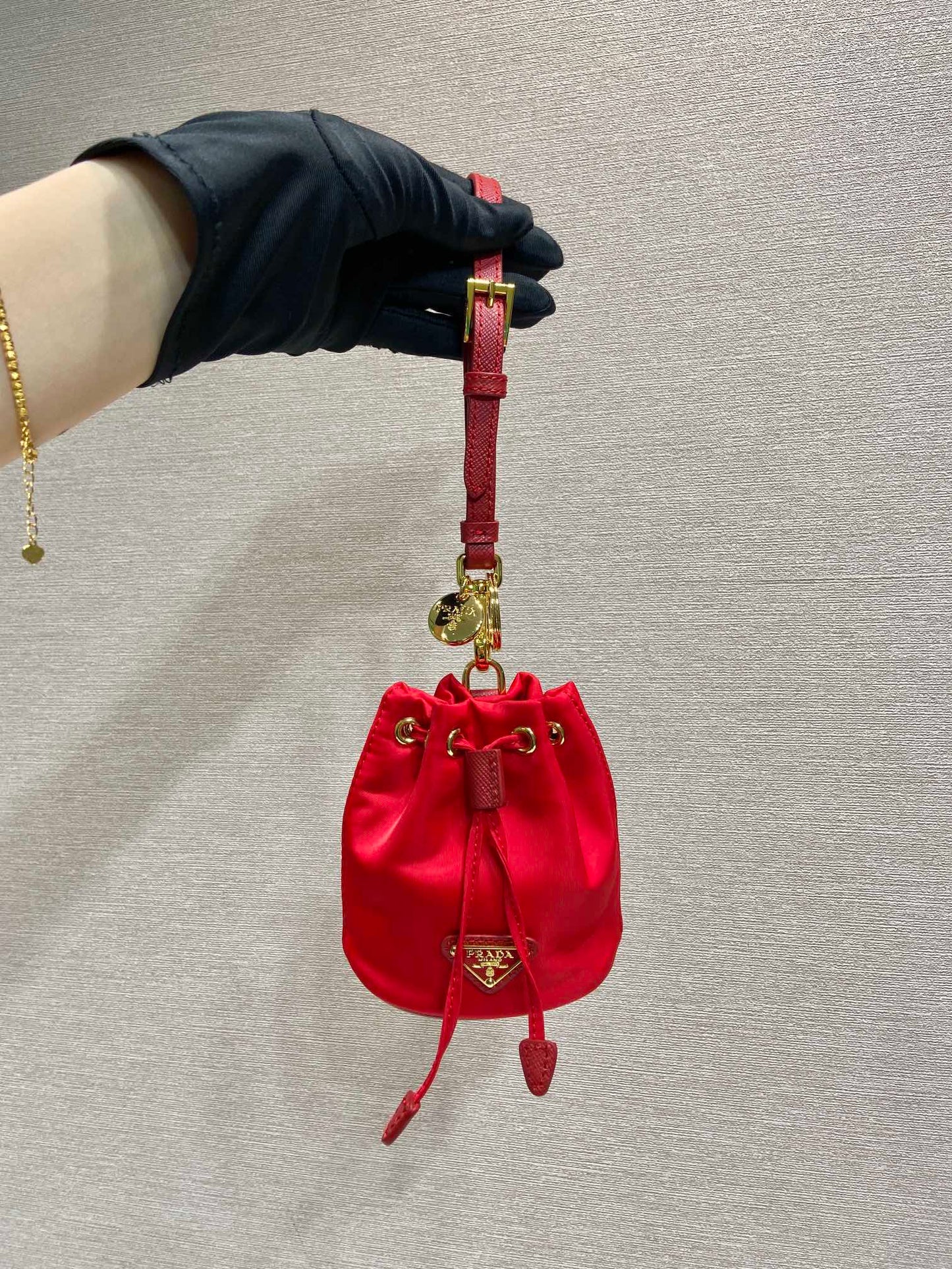 MINI BUCKET BAG 10 IN RED RE-NYLON AND SAFFIANO LEATHER STRAP mysite