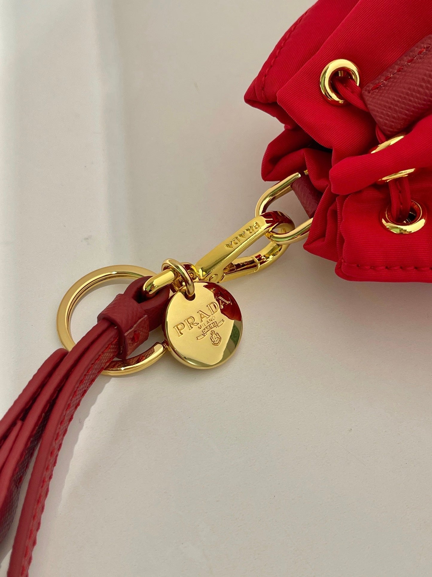 MINI BUCKET BAG 10 IN RED RE-NYLON AND SAFFIANO LEATHER STRAP mysite